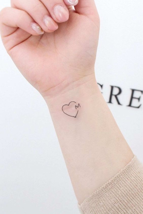 41 Petits tatouages à la fois minimalistes et discrets 40